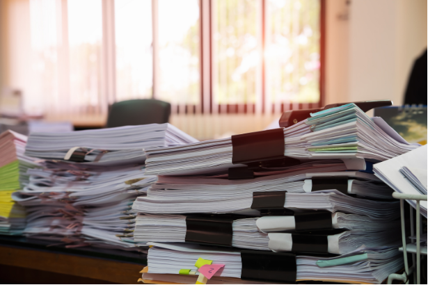 Compliance manager reviewing adviser files