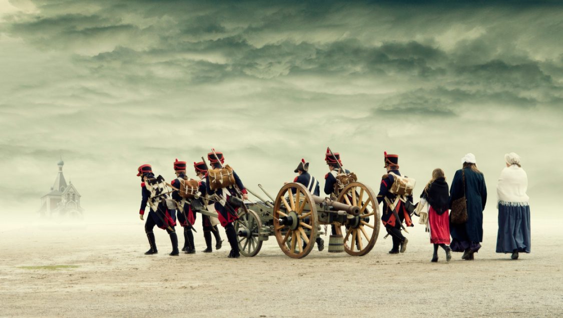 Napoleonic,Soldiers,And,Women,Marching,And,Pulling,A,Cannon,Through